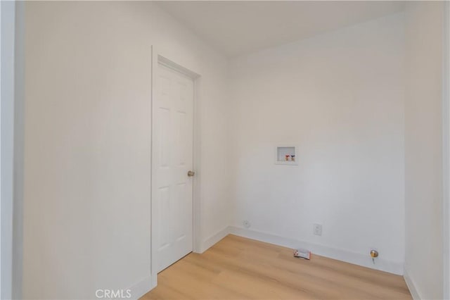 15058 Gale Ave, Hacienda Heights, CA 91745 - laundry room with light wood-style floors, washer hookup, and baseboards