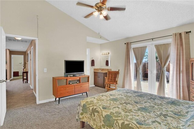 18603 Mecca St, Hesperia, CA 92345 - bedroom featuring french doors, lofted ceiling, light colored carpet, baseboards, and a textured ceiling