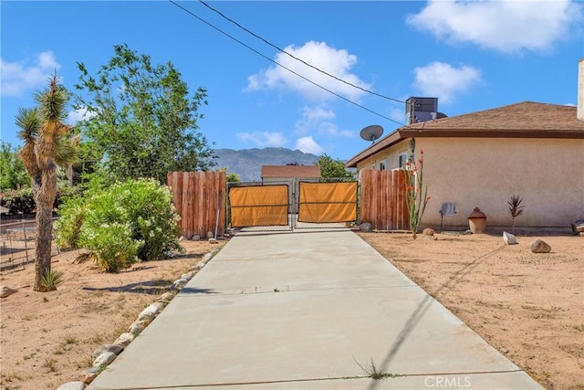 18603 Mecca St, Hesperia, CA 92345 - view of yard with a gate and a mountain view
