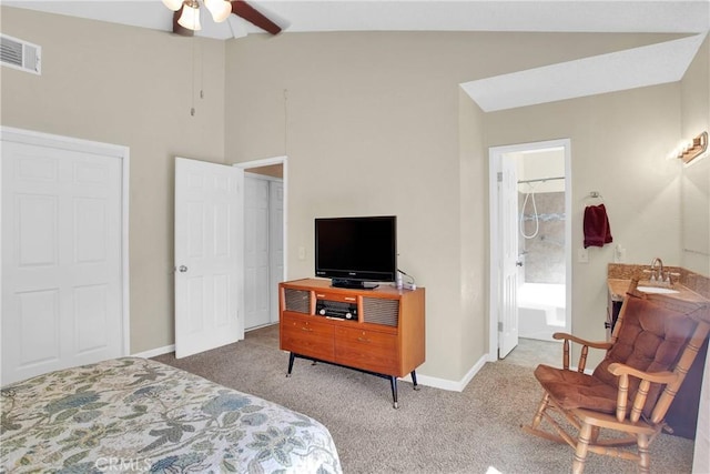 18603 Mecca St, Hesperia, CA 92345 - carpeted bedroom with baseboards, vaulted ceiling, connected bathroom, a ceiling fan, and a sink