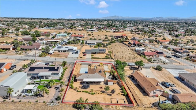 18603 Mecca St, Hesperia, CA 92345 - aerial view of residential area with mountains and property parcel outlined