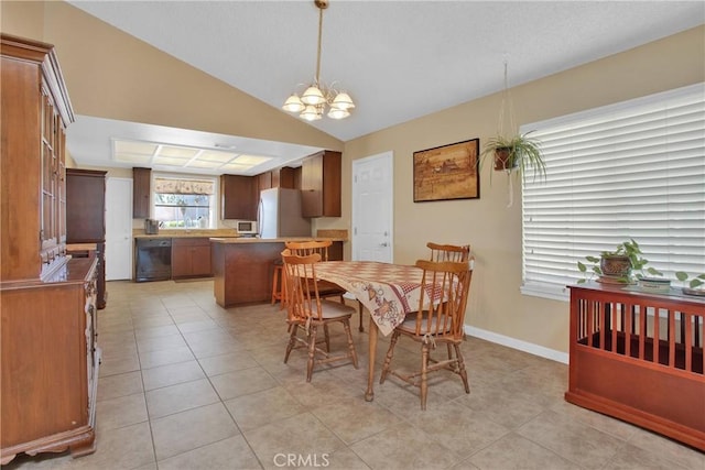 18603 Mecca St, Hesperia, CA 92345 - dining space with a chandelier, light tile patterned flooring, lofted ceiling, and baseboards