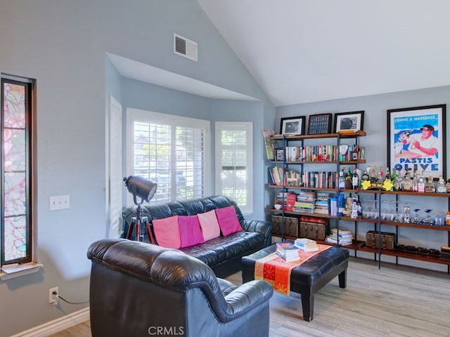 1400 Ashley Pl, Upland, CA 91784 - living room with wood finished floors and high vaulted ceiling