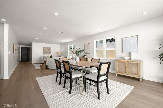2009 Pattiz Ave, Long Beach, CA 90815 - dining space with light wood-style floors, baseboards, and recessed lighting