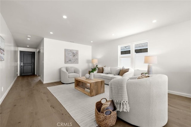 2009 Pattiz Ave, Long Beach, CA 90815 - living area featuring wood finished floors, baseboards, and recessed lighting