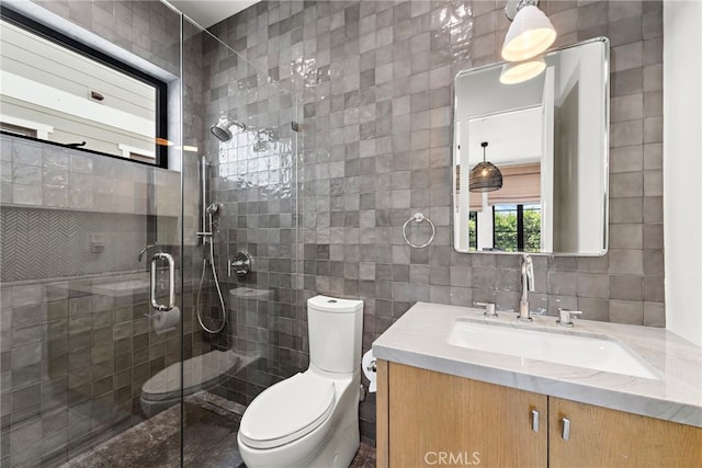 213 Avenida Princesa, San Clemente, CA 92672 - bathroom with toilet, vanity, tile walls, and a tile shower