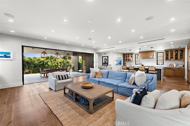 213 Avenida Princesa, San Clemente, CA 92672 - living area featuring recessed lighting, wet bar, light wood-style floors, and baseboards