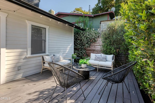 4865 Granada St, Los Angeles, CA 90042 - wooden deck featuring an outdoor living space