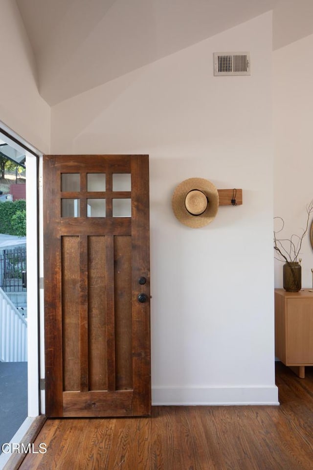 4865 Granada St, Los Angeles, CA 90042 - entrance foyer featuring vaulted ceiling, wood finished floors, and baseboards