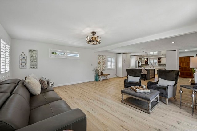 3925 Linmar Ln, Carlsbad, CA 92008 - living room with a chandelier, light wood finished floors, and recessed lighting
