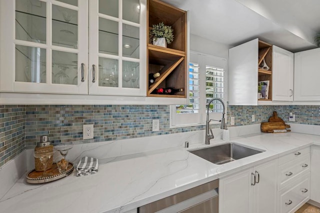 3925 Linmar Ln, Carlsbad, CA 92008 - kitchen with open shelves, dishwasher, tasteful backsplash, white cabinetry, and light stone countertops