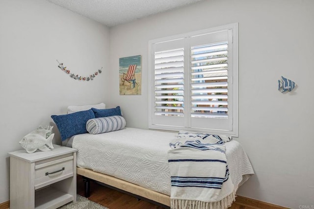 3925 Linmar Ln, Carlsbad, CA 92008 - bedroom featuring wood finished floors and a textured ceiling