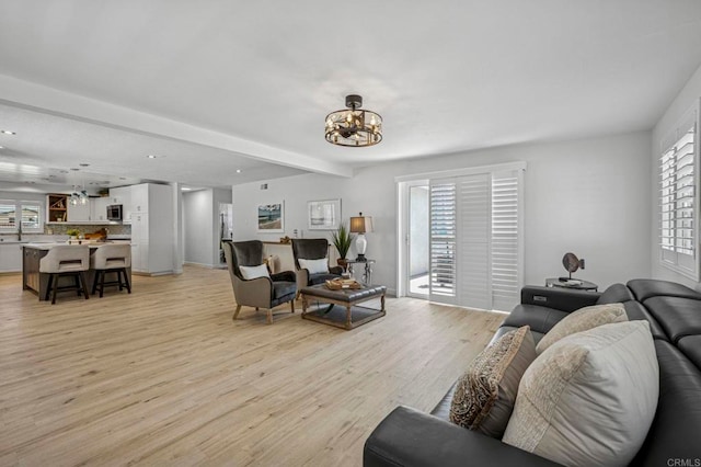 3925 Linmar Ln, Carlsbad, CA 92008 - living room featuring a chandelier, light wood-type flooring, and recessed lighting
