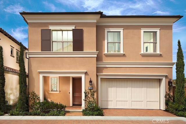 110 Rimstone, Irvine, CA 92618 - view of front of home with stucco siding and an attached garage