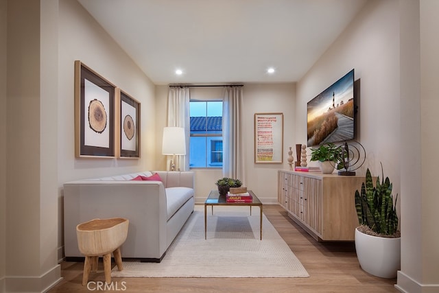 110 Rimstone, Irvine, CA 92618 - living area featuring light wood-style flooring, baseboards, and recessed lighting