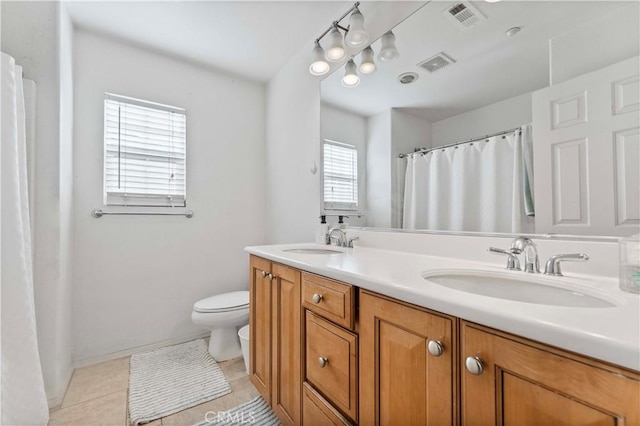 15601 N Peak Ln, Fontana, CA 92336 - full bathroom featuring toilet, double vanity, tile patterned flooring, baseboards, and a shower with shower curtain