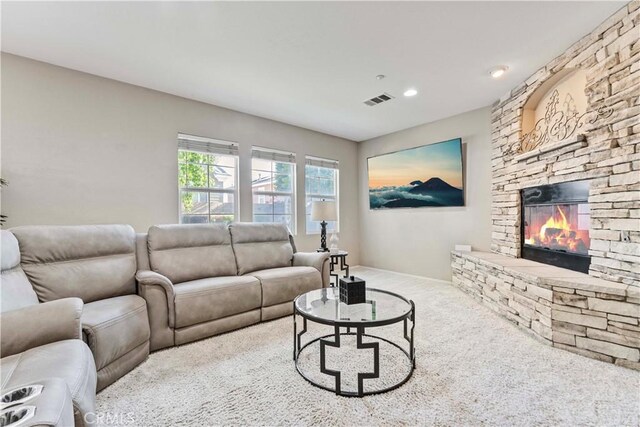 15601 N Peak Ln, Fontana, CA 92336 - carpeted living area with a fireplace and recessed lighting