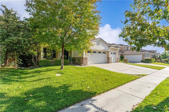 15601 N Peak Ln, Fontana, CA 92336 - view of front of home with concrete driveway, a garage, and a front yard