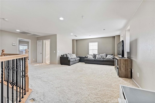 15601 N Peak Ln, Fontana, CA 92336 - living room featuring light carpet, baseboards, and recessed lighting