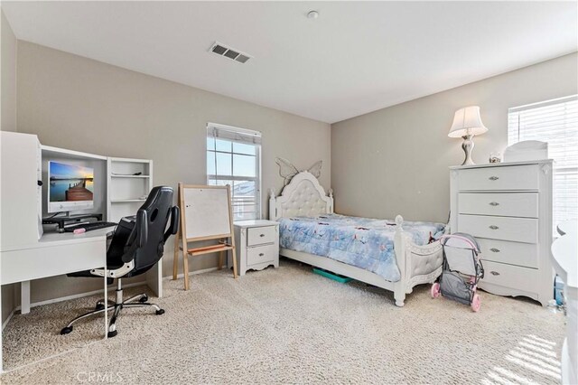 15601 N Peak Ln, Fontana, CA 92336 - carpeted bedroom featuring a desk