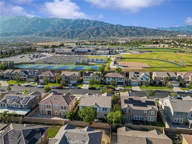 15601 N Peak Ln, Fontana, CA 92336 - aerial perspective of suburban area featuring a mountainous background