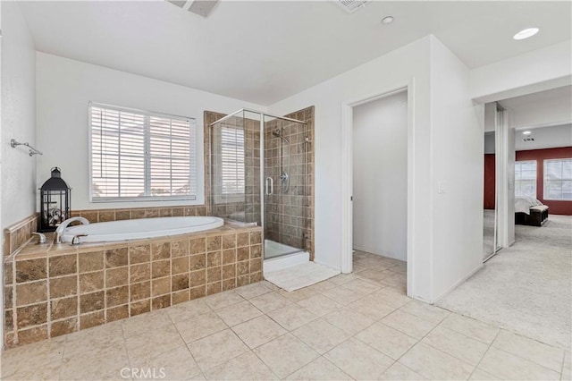 15601 N Peak Ln, Fontana, CA 92336 - ensuite bathroom featuring a garden tub, a shower stall, and tile patterned flooring