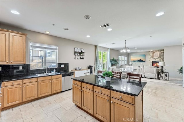 15601 N Peak Ln, Fontana, CA 92336 - kitchen featuring stainless steel dishwasher, a sink, recessed lighting, a chandelier, and a center island