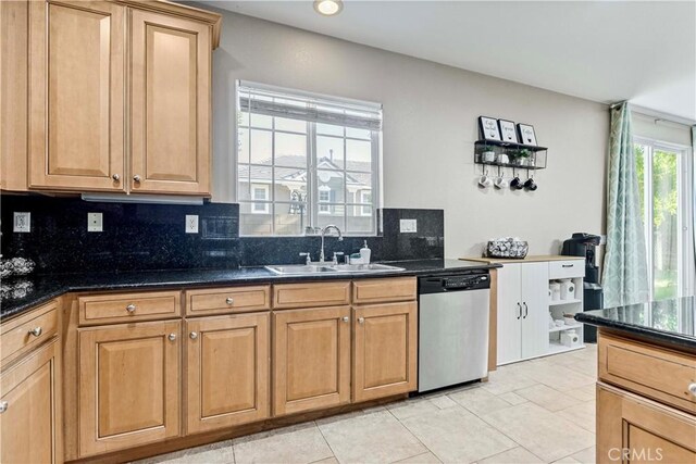 15601 N Peak Ln, Fontana, CA 92336 - kitchen featuring dishwasher, decorative backsplash, light tile patterned flooring, and dark stone counters