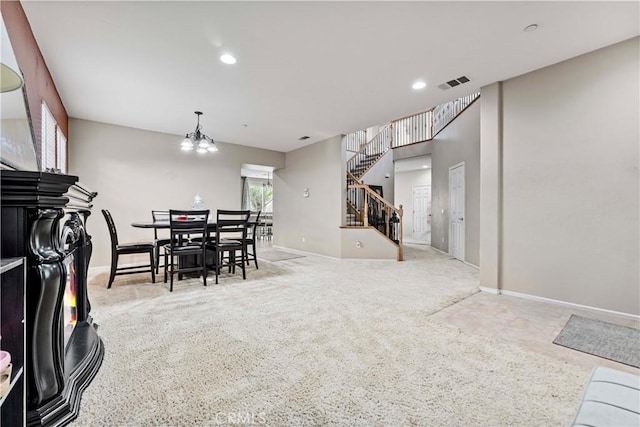15601 N Peak Ln, Fontana, CA 92336 - dining space featuring stairway, carpet flooring, baseboards, and recessed lighting