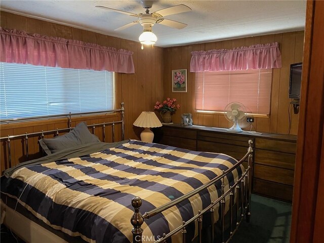 320 Starvation Flats Rd, Big Bear Lake, CA 92315 - bedroom with wood walls and a ceiling fan