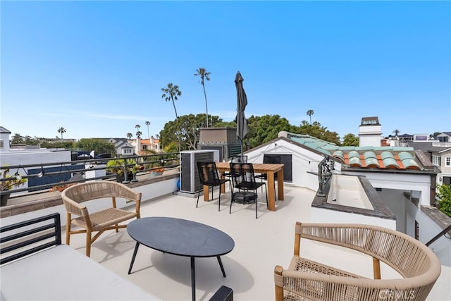 332 L St, Newport Beach, CA 92661 - view of patio with a balcony, outdoor dining space, and central air condition unit