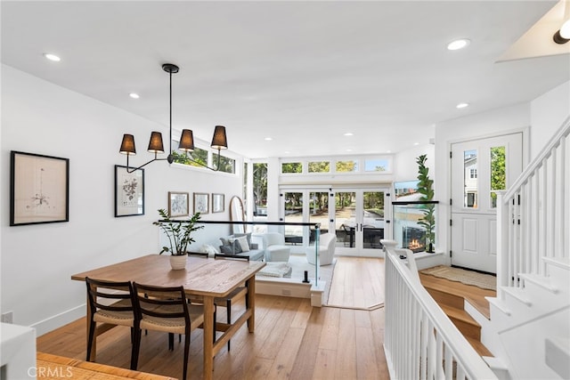 332 L St, Newport Beach, CA 92661 - dining area with recessed lighting, stairway, light wood-style flooring, baseboards, and french doors
