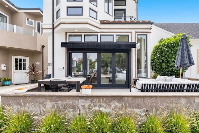 332 L St, Newport Beach, CA 92661 - view of exterior entry with french doors and stucco siding