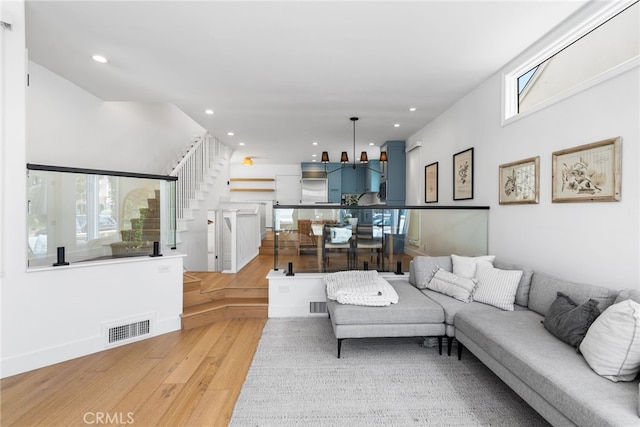 332 L St, Newport Beach, CA 92661 - living area with wood finished floors, recessed lighting, and stairway