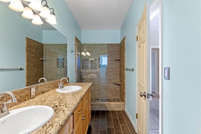 22104 Mccarthy Dr, Tehachapi, CA 93561 - full bath with walk in shower, double vanity, and a chandelier