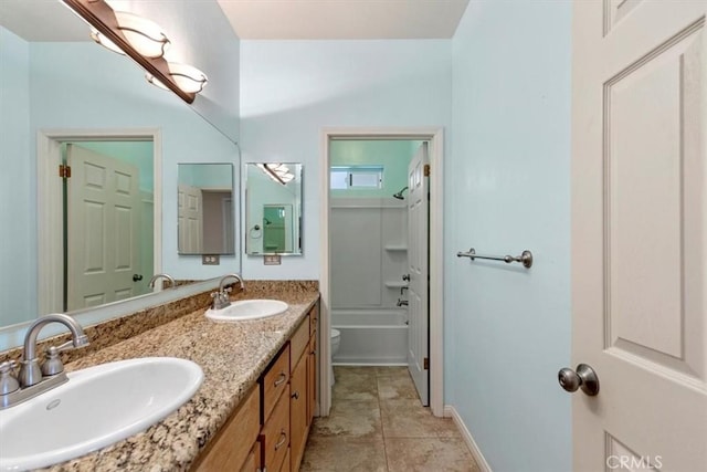 22104 Mccarthy Dr, Tehachapi, CA 93561 - bathroom featuring double vanity, toilet, bathing tub / shower combination, tile patterned floors, and baseboards