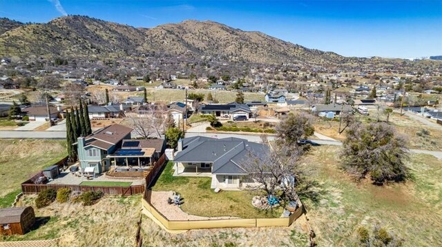 22104 Mccarthy Dr, Tehachapi, CA 93561 - aerial view of residential area featuring a mountainous background