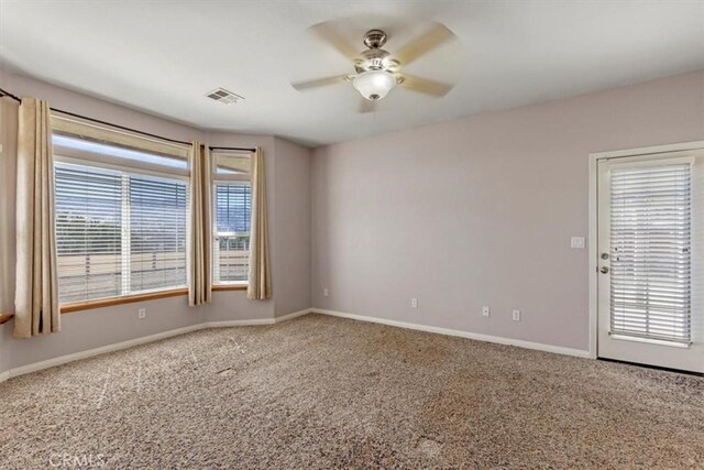 22104 Mccarthy Dr, Tehachapi, CA 93561 - unfurnished room featuring a ceiling fan, carpet floors, and baseboards