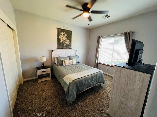 22104 Mccarthy Dr, Tehachapi, CA 93561 - bedroom with carpet, baseboards, and a ceiling fan