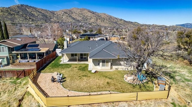 22104 Mccarthy Dr, Tehachapi, CA 93561 - aerial view of residential area with a mountainous background