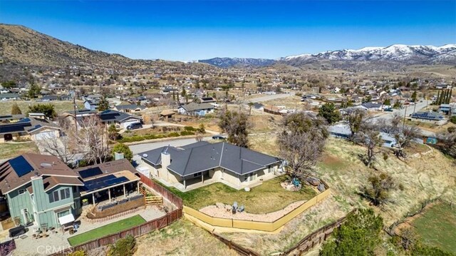 22104 Mccarthy Dr, Tehachapi, CA 93561 - aerial perspective of suburban area with a mountain backdrop