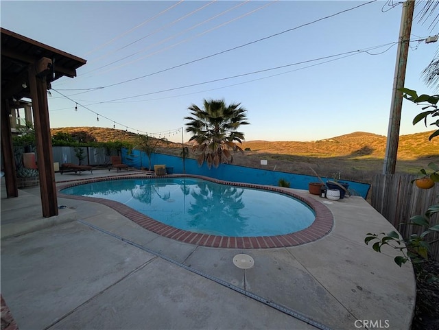23040 Giant Fir Pl, Canyon Lake, CA 92587 - view of swimming pool with a patio area and a fenced backyard