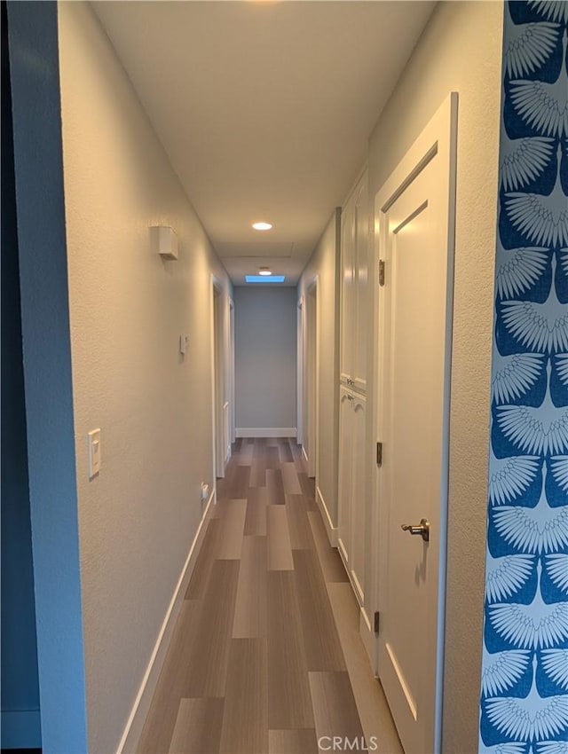 23040 Giant Fir Pl, Canyon Lake, CA 92587 - hallway featuring wood finished floors, recessed lighting, and baseboards