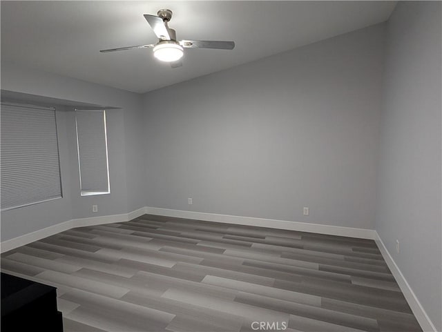 23040 Giant Fir Pl, Canyon Lake, CA 92587 - spare room with a ceiling fan, wood finished floors, and baseboards