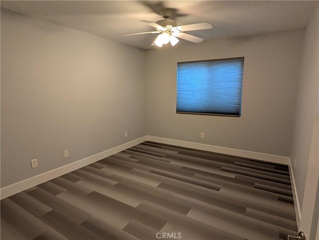 23040 Giant Fir Pl, Canyon Lake, CA 92587 - empty room with baseboards, ceiling fan, and dark wood-style floors
