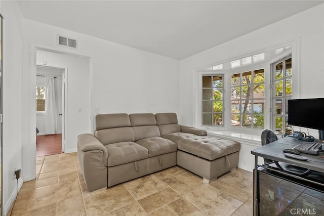 13247 Mission Tierra Way, Granada Hills, CA 91344 - living area with stone tile flooring and baseboards