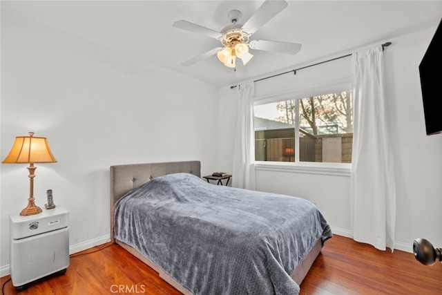 13247 Mission Tierra Way, Granada Hills, CA 91344 - bedroom with baseboards, wood finished floors, and a ceiling fan