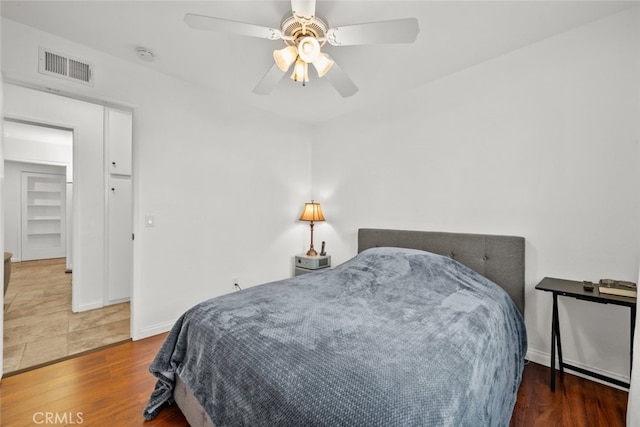13247 Mission Tierra Way, Granada Hills, CA 91344 - bedroom featuring wood finished floors, baseboards, and a ceiling fan