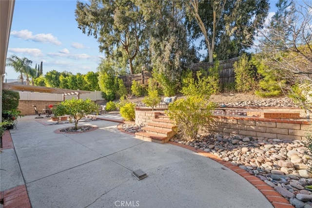 13247 Mission Tierra Way, Granada Hills, CA 91344 - fenced backyard with a patio