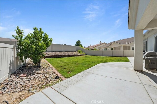 10237 Cotoneaster St, Apple Valley, CA 92308 - view of yard featuring a patio area